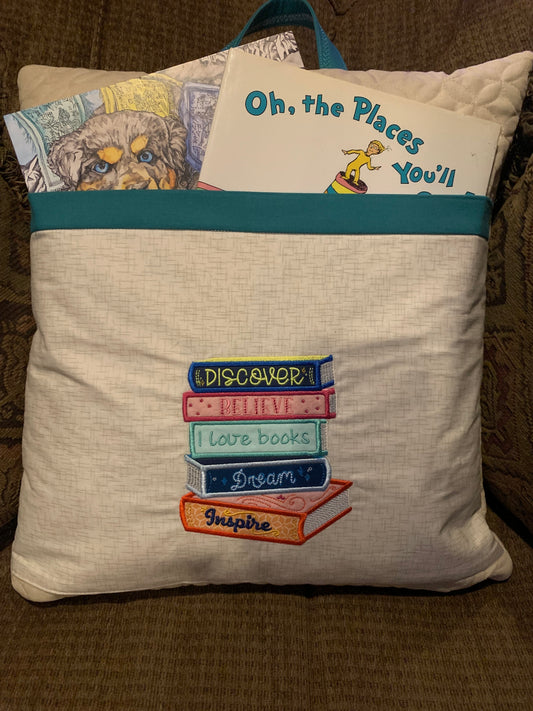 Pillow with pocket for books and handle to carry(books not included)